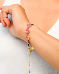 PULSERA HAPPY FACE FUXIA