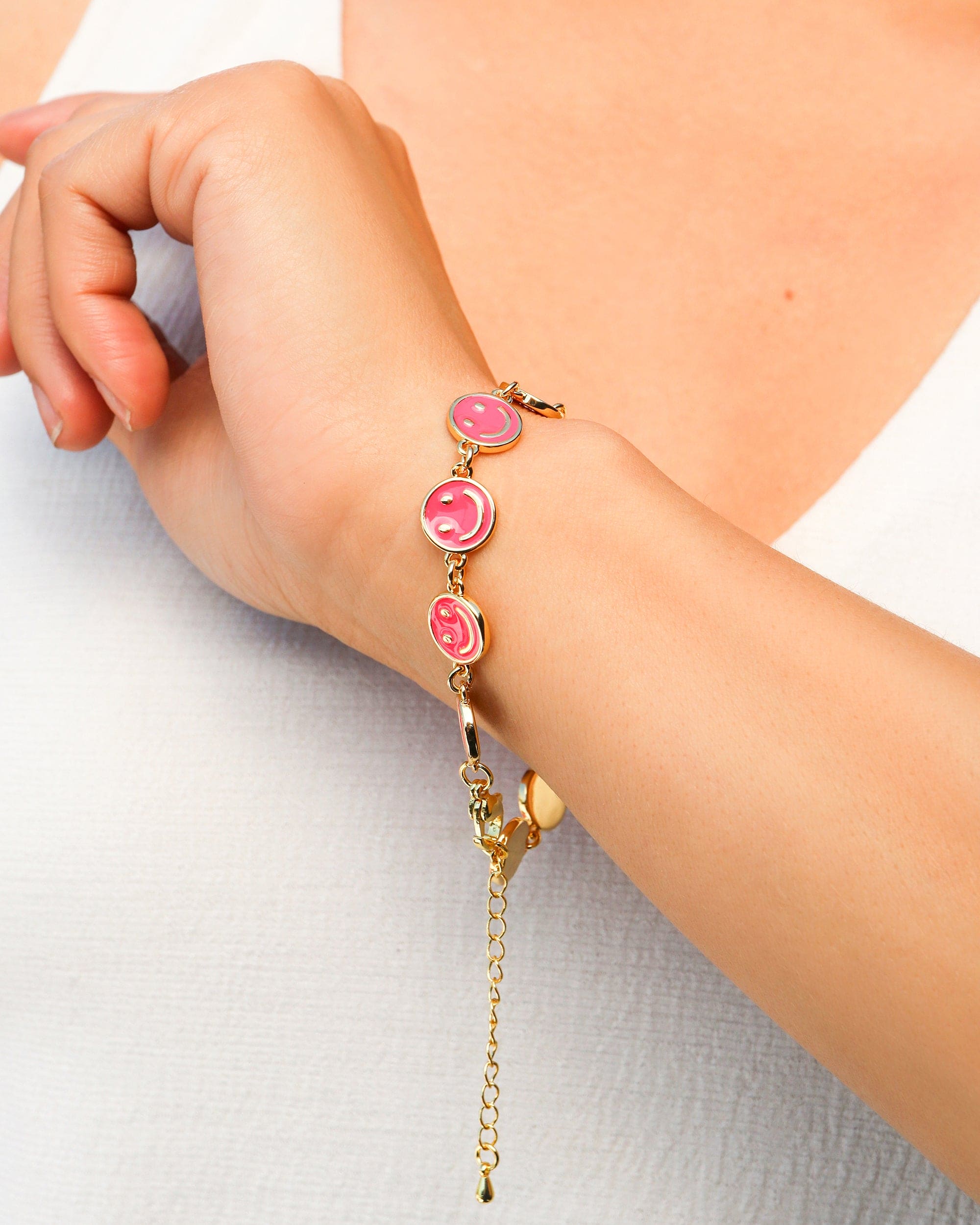 PULSERA HAPPY FACE FUXIA